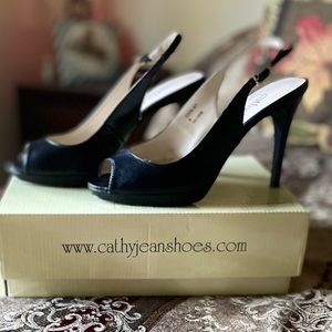 Sling back peep toe heels. Black. Size 8. Great condition.